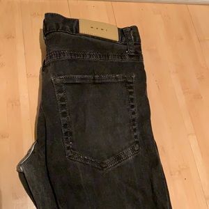 Black jeans ripped knees